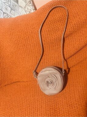 Charlie Paige Round Taupe Flower Applique Shoulder Bag with Zip Closure
